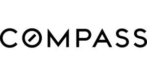 A black and white logo of compass